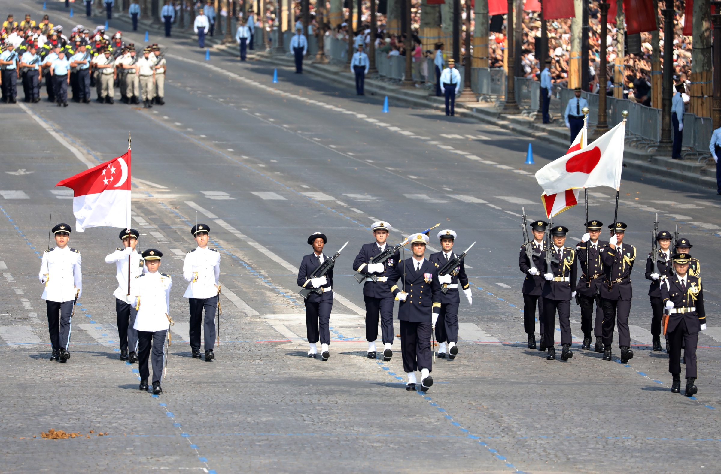 Singapore and Japan contingents in French National Day parade on 14 Jul 2018 (MCI Photo by Fyrol)
