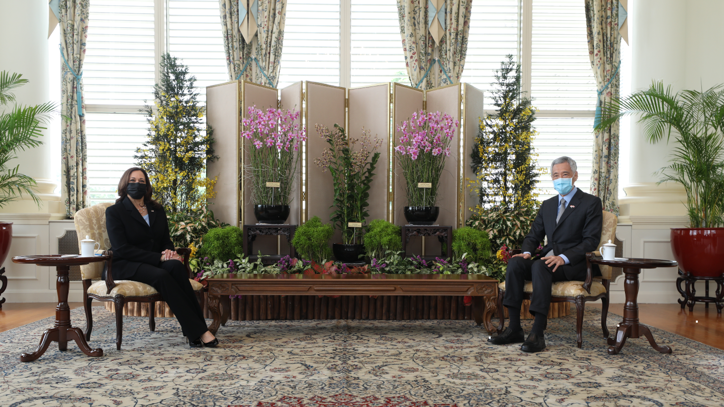 VP Harris and PM Lee sitting down together png