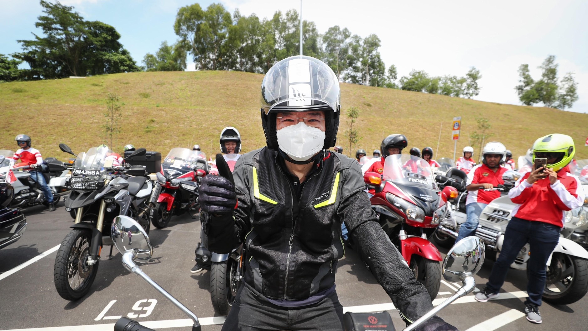 20220814 Lawrence Wong Rider Aid Singapore feature jpg