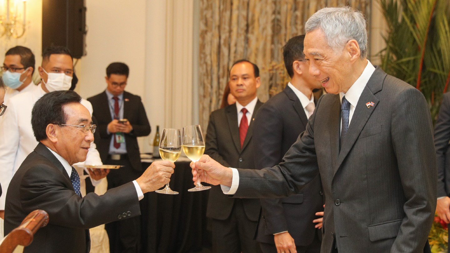 20220928 - PM Lee at Visit by Laos PM_feature jpg