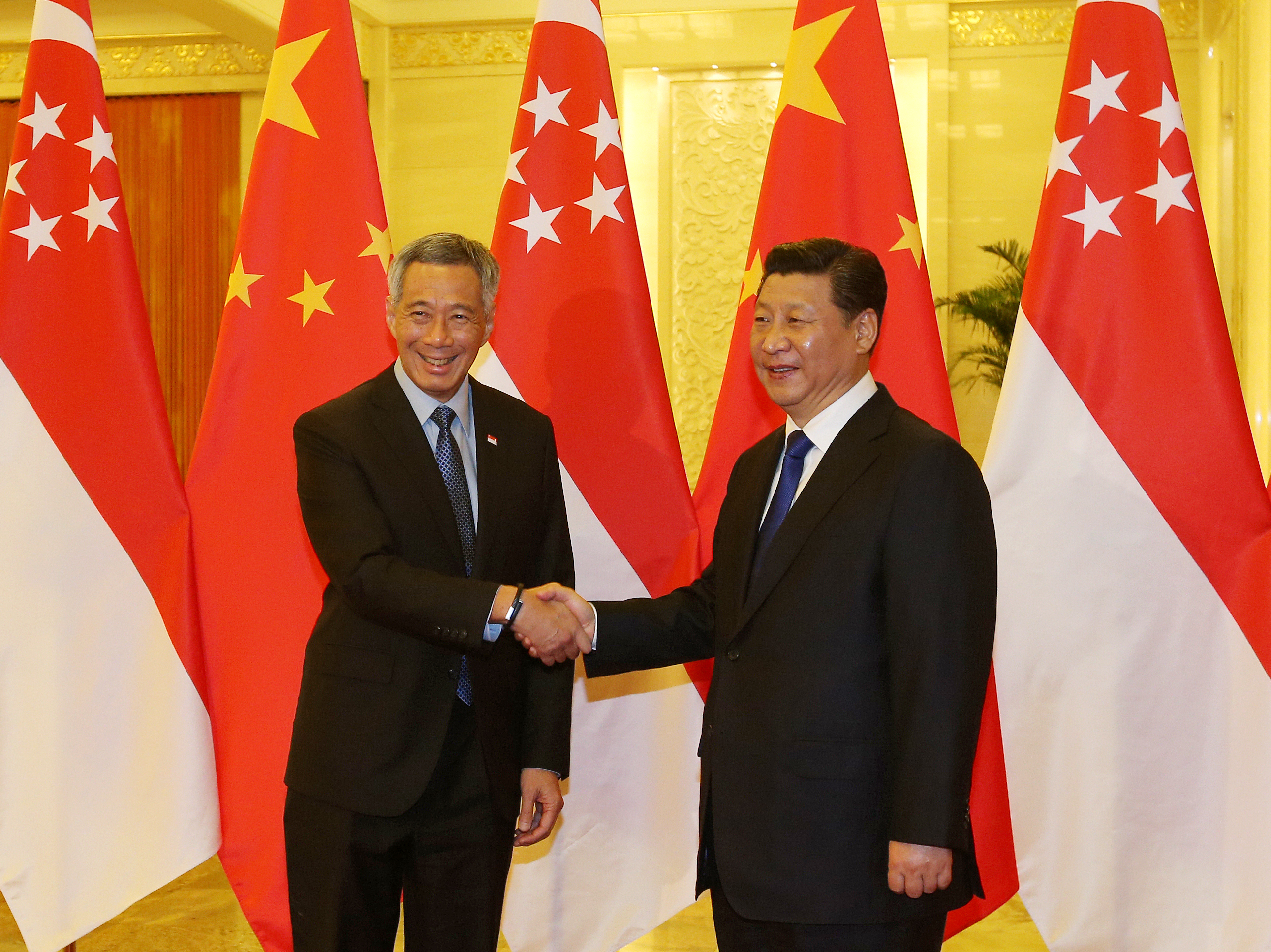 Prime Minister meeting PRC President Xi Jinping at the Great Hall of the People, Beijing, China on 9 Nov 2014 (LHZB Photo © Singapore Press Holdings Limited) 