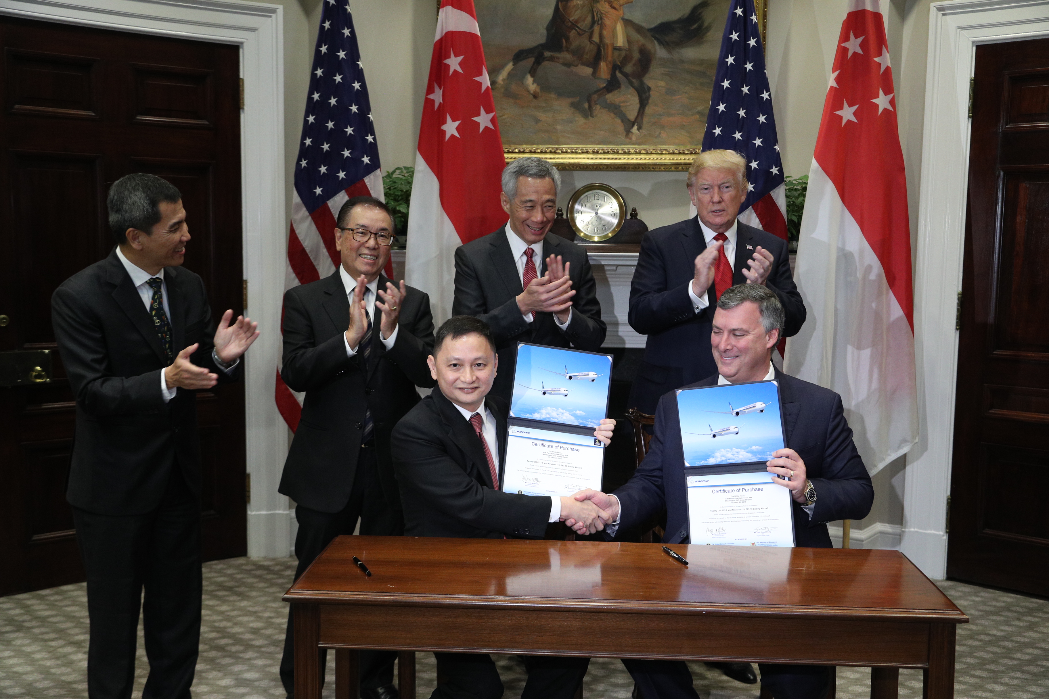 Signing ceremony between SIA and Boeing on 23 Oct 2017 (MCI Photo by Kenji Soon)