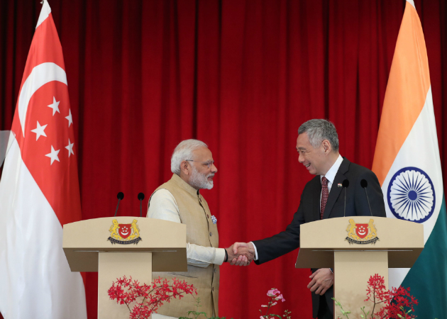 PM Modi and PM Lee witnessing the exchange of M