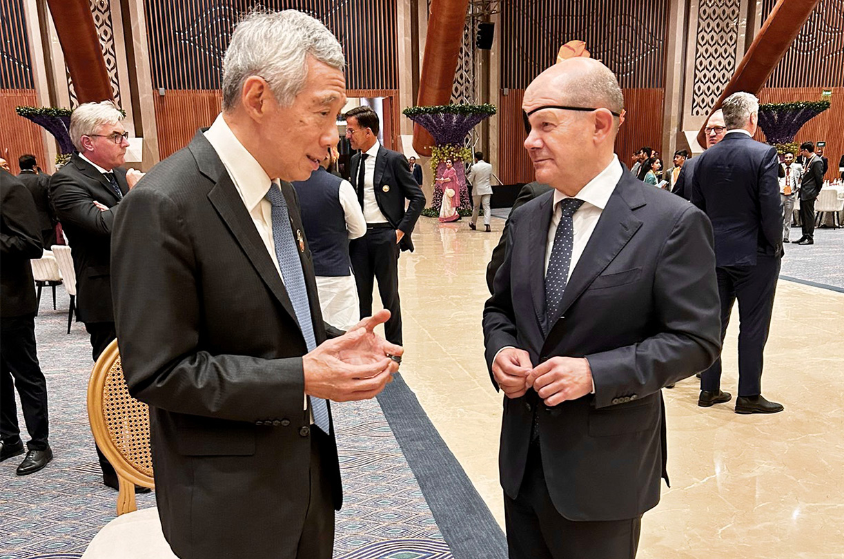 G20India_Dinner_PM Lee with German Federal Chancellor Olaf Scholz_edited jpg